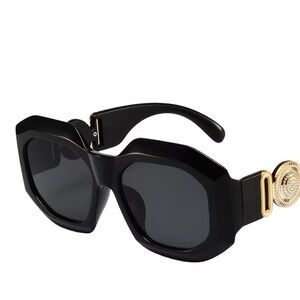 Elegant Black Sunglasses with Gold Accents